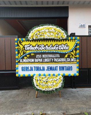 Papan Bunga Duka di Gending